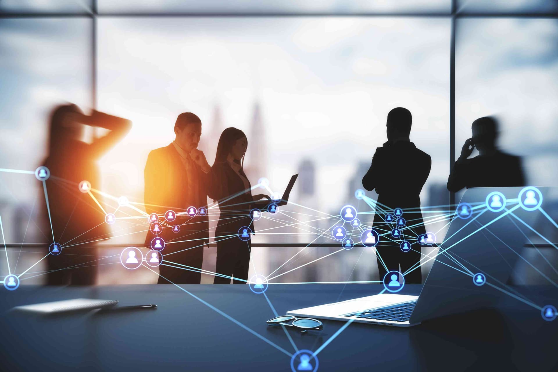 Dynamics Monk business leaders collaborating across connected teams, highlighting governance, stakeholder alignment and secure Microsoft Dynamics 365 decision-making.